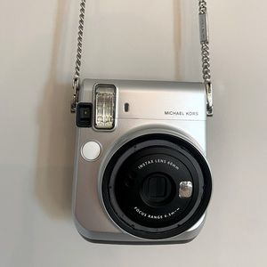 Exclusive Michael Kors Instax camera with silver camera shoulder chain